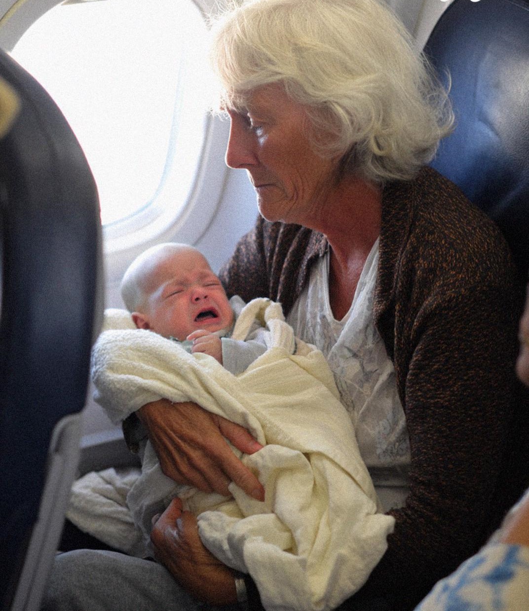 Man Kicked Me Out of My Seat Over My Crying Granddaughter – But He Never Expected Who Sat Down Next
